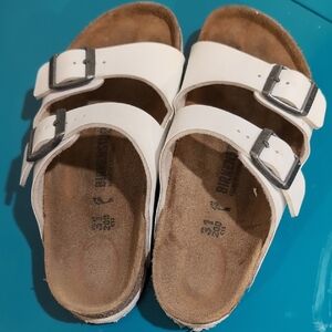 Birkenstock White Sandals with Adjustable Straps and Contoured Footbed